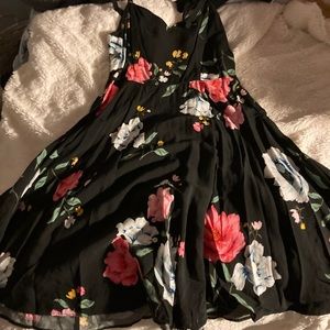 Black dress with pink blue and yellow flowers